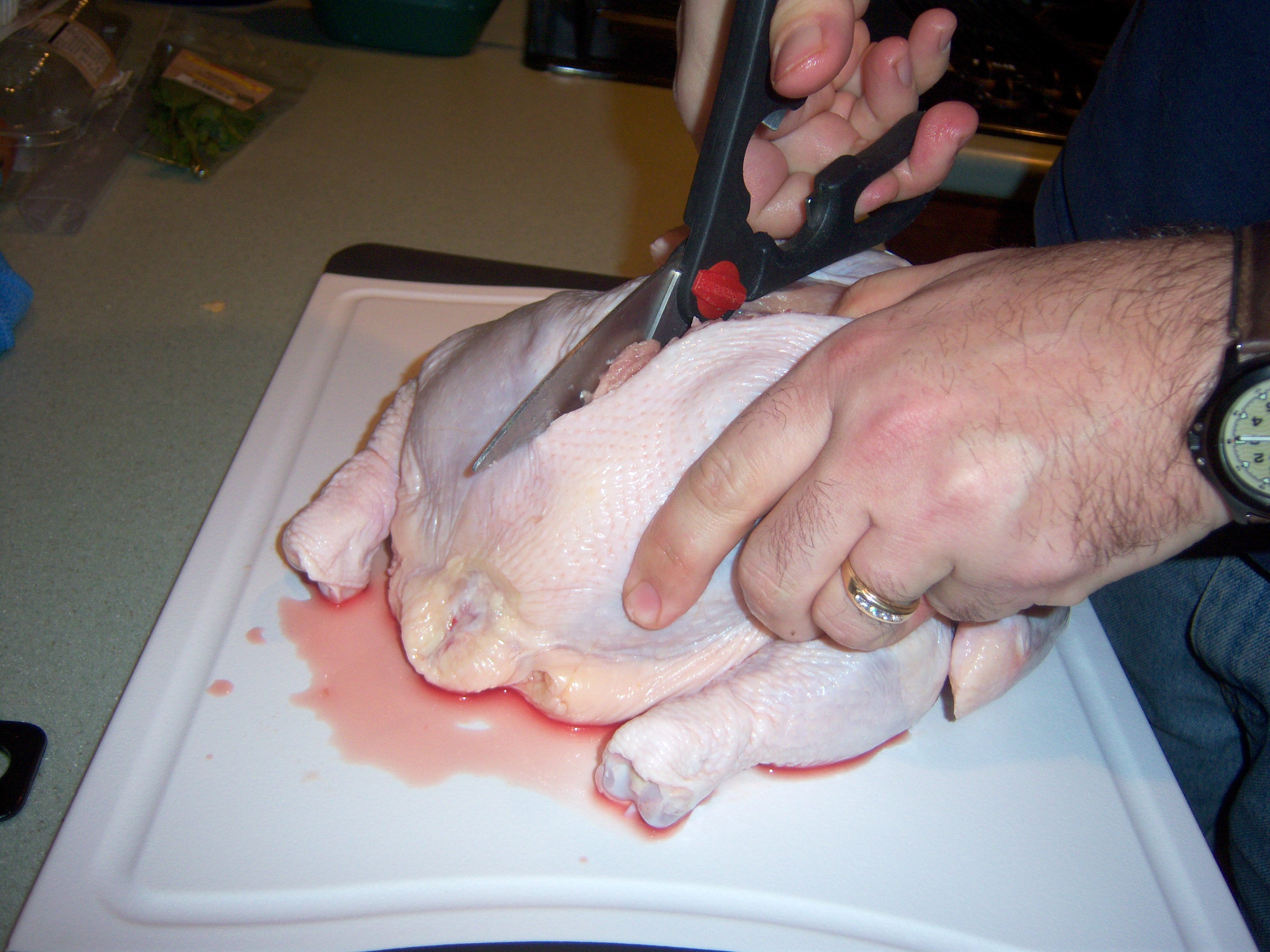 Cutting up the chicken